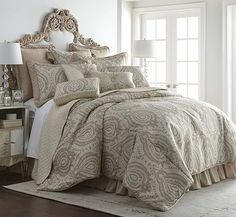 the comforter is neatly made and ready to be used in the bedroom or sitting area