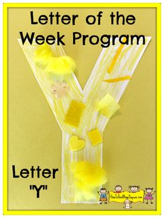 the letter y is made out of construction paper and yellow pom - poms