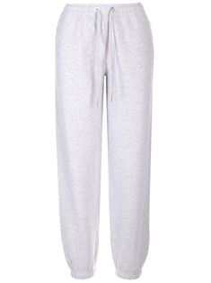 Grey sweatpants from Moncler in cotton jersey and metallic thread, waist with drawstring, two side pockets, logo patch with crystals. Cropped Sweatpants, Fitness Style, Nike High, Cuffed Joggers, Jeans Logo, Fitted Joggers, Fleece Sweatpants, Grey Sweatpants, Tracksuit Bottoms