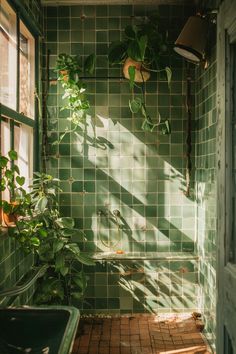 a green tiled bathroom with plants growing on the wall and window sill in the corner