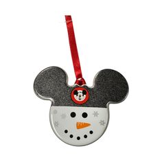 a mickey mouse ornament hanging from a red ribbon