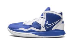 the nike zoom basketball shoe is blue and white