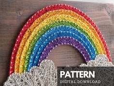 a rainbow string art sign with the words ready - made written in front of it