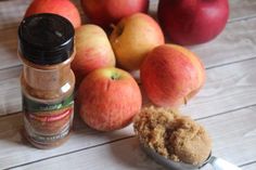 apples, cinnamon sugar and spices on a table