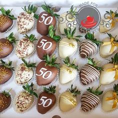 chocolate covered strawberries are arranged in the shape of heart - shaped hearts and numbers