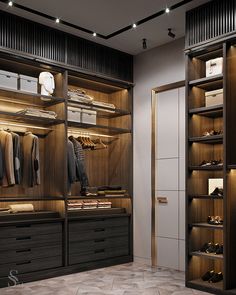 a walk in closet filled with lots of clothes