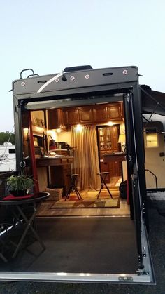 the inside of a trailer with its door open