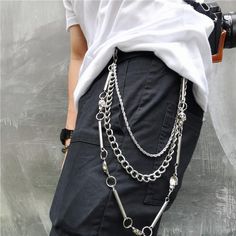 Triple Hardware Belt Chain A killer chrome triple layer chain belt with clasps at each end. Skull, O-Ring and bar embellishments on multi-sized chain links. Chain #1 Length: 14.2"/36cm. Chain #2 Length: 16.9"/43cm. Chain #3 Length: 21.3"/54cm. Material: Stainless Steel/Alloy. Edgy Metal Chain Belt, Edgy Chain Link Belt With Chain Strap, Edgy Chain Link Belt, Silver Punk Chain Link Belt, Silver Metal Chain Belt With Metal Decoration, Gothic Silver Metal Chain Belt, Silver Punk Chain Belt With Adjustable Chain, Silver Adjustable Chain Punk Belt, Silver Punk Chain Belt