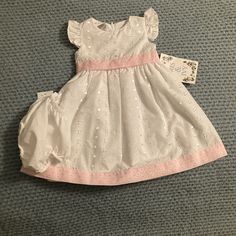 Beautiful White Dress For Toddler Girl. Has Matching Diaper Cover Attached. White Princess Style Cotton Dress, Spring Princess Baptism Dress, White Princess Style Baptism Dress For Summer, White Princess Baptism Dress For Summer, Spring Princess Dress With Flutter Sleeves, White Flutter Sleeve Playtime Dress, Spring Baptism Dress With Ruffles, Dress For Toddler Girl, Floral Print Party Dress