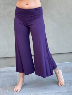 caraucci women's plant-based rayon jersey cropped purple wide leg pants #color_plum Transitional Fabric, Cropped Flare Pants, Flare Pant, Lycra Fabric, Cropped Flares, Cooler Weather, Draped Fabric, Dress With Boots, Flare Pants