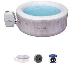 an inflatable hot tub with the lid open and accessories around it on a white background