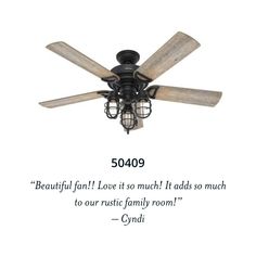 a black ceiling fan with two light bulbs and a quote from cyndi on it