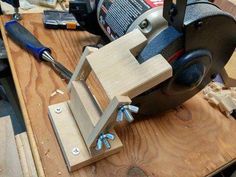 a circular saw is being used to cut wood with a jik and other tools