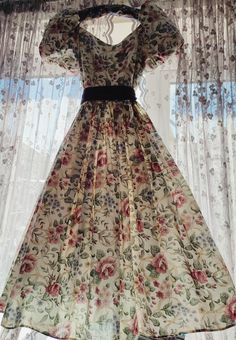 🌸Vintage 1990s puffed sleeved floral dress with netting underneath. 🌸Black velvet sash tie belt  🌸Size girls age 9 upwards / ladies size 4 approx  🌸Measurements are from top of shoulder to hem 108 cm /54 inches  Pit to pit straight across 33 cm /16 inches  🌸Excellent condition  🌸Polyester cotton mix fabric  Zip back  Machine washable  For more beautiful vintage clothing check out our Etsy shop https://tillyswonder.etsy.com Please note I do not ship to Germany due to the new packaging laws. Ladies Dress, Mixing Fabrics, Dream Wardrobe, Black Velvet, Vintage Floral, Floral Dress, Vintage Outfits, Girls Dresses, Style Inspiration