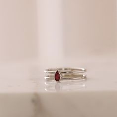 Pear Shape Ruby Solitaire Ring, Double Banded Ruby Ring, 14K Solid Gold Ring, Teardrop Ruby Solitaire Ring, Gifts for Her ≫ Product Details ◈ Handmade / Handcrafted Fine Jewelry ◈ Stone: 100% Natural Ruby ◈ Stone Size: 5mm x 3mm ◈ Band Thickness: 3.5mm ◈ Metal: Solid 14K Gold ◈ Gold Color: White gold, Rose gold, Yellow gold ≫ Please read our FAQ below for more detail. Red Sapphire Ring, Ruby Solitaire Ring, Ring Teardrop, Double Band Rings, Pear Shaped Ring, Gold Heart Ring, Red Sapphire, Solid Gold Ring, Jewelry Stone