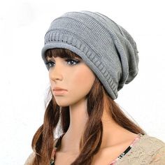 This knitted slouchy beanie cap made with a cotton/polyester blend is trendy while still keeping your ears and head warm during this cold season. Comes in 5 fab colors. Buy 3 together and save $5 using discount code SLOUCHIEBEANIE at checkout. Slouchy Winter Hat, Girls Knit Hat, Yarn Hats, Striped Beanies, Beanie Hats For Women, Fall Hats, Wool Caps, Slouch Beanie, Casual Cap