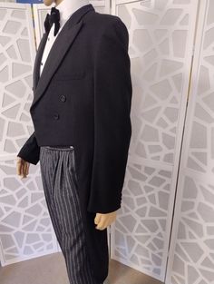 This is a fabulous tails jacket by Keith Courtenay label in a fine wool I believe from the 60s and was sold by Ottreys mens wear of 258 Collins St Melbourne. The jacket is traditionally tailored with an open front and designed to just meet at the front unbuttoned and cut straight to waist level at the front. Below the waist the tail section starts 12cm from the side seam and continues around the back split to waist level and trimmed with two buttons. The jacket is in good condition and lined in Mens Wear, Tuxedo Jacket, The 60s, Black Wool, Shoulder Sleeve, Black Pants, Large Size, Melbourne, Favorite Outfit