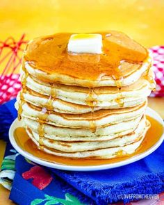 a stack of pancakes with butter on top