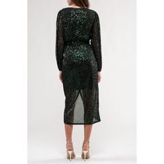 Introducing the August Sky Women's Sequin Faux Wrap Midi Dress, your ultimate party companion for ringing in the New Year or dazzling at any formal event. This dress features a captivating V-neckline with a hidden snap closure, adding an element of allure to your look. With elastic around the waistline, it guarantees a comfortable and flattering fit, while the long sheer puff sleeves, adorned with elastic openings, exude a touch of glamour. A faux tie around the waistline adds a hint of playfulness. Lined to perfection to prevent any sheerness, this dress showcases an alluring tulip hemline. Embrace the spotlight with this shimmering sequin ensemble that's bound to steal the show wherever you go. Ringing In The New Year, Wrap Midi Dress, Sheer Sleeves, Puff Sleeves, Formal Event, Snap Closure, Dark Green, Puff Sleeve, Fitness Fashion