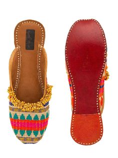 Multi juttis with all-over geometric motifs and embellished with ghunghroos. Color: Multi Colored Fabric: Upper: Acrylic Insole - Leatherette Sole - Vegetable tanned Leather Sole Note: The product will be shipped within 20-25 days of the order placed Any slight irregularities are distinctive and are inherent to the beauty of this creation as it is precisely crafted by hands. Care intructions - Keep in dust bag, dry clean only, embellished accessory needs to be handled with care. You can also use Multicolor Slip-on Flats For Festival, Multicolor Flat Shoes For Festive Occasions, Traditional Multicolor Flats For Festivals, Festive Multicolor Gota Work Flats, Festive Multicolor Flats With Gota Work, Multicolor Slip-on Flats With Gota Work, Traditional Multicolor Flats For Festive Occasions, Festive Multicolor Slip-on Flats, Multicolor Flats For Festivals