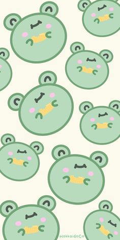 a group of green teddy bears with faces drawn on them, all in the same pattern