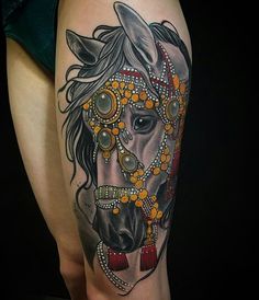 a woman with a horse tattoo on her leg and the words instagramm above it