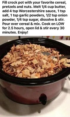 a crock pot full of crackers and nuts with text overlay that reads, fill crock pot with your favorite cereal, freezer