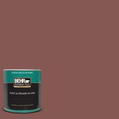 the behr paint is dark brown and has a light green tint on it