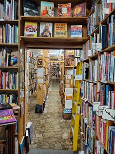 the inside of a book store filled with lots of books