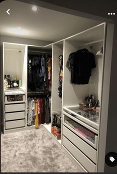 the closet is full of clothes and other things to wear in it's storage area