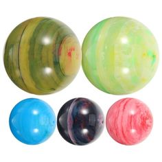 four different colored balls are shown on a white background