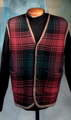 "Vintage Tommy Hilfiger Wool Cotton Blend Plaid Vest Waistcoat.  Vintage I think from 1980s but just guessing. It is Red Tartan Plaid with Black and a bit of Green. It is a substantial Wool / Cotton Blend. 65% Wool 35% Cotton. The back is of the same blend. Leather Trim - Leather Buttons. 2 patch pockets. In Very Good vintage condition please use the photographs as part of the description. It is a Mens Large Please check measurements.  Measures flat as 19\" across shoulders 24\" across the chest at armpit level 27 1/2\" long down center back  27 1/2\" in the front. Please check the measurements and ask any questions or for more photos as there are no returns" Vintage Winter Vest Outerwear, Classic Red Winter Vest, Classic Red Vest For Fall, Vintage Red Sweater Vest For Fall, Red Vintage Sweater Vest For Fall, Classic Red Sleeveless Outerwear, Vintage Red Vest For Winter, Retro Red Winter Vest, Red Retro Winter Vest