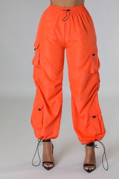 Orange Stretch Bottoms For Streetwear, Solid Color Nylon Bottoms For Streetwear, Stretch Nylon Cargo Pants With Drawstring, Trendy High-waisted Bottoms With Drawstring, Solid Color High-waist Nylon Bottoms, Trendy High Waist Drawstring Bottoms, Solid Color High Waist Nylon Bottoms, Solid High Waist Nylon Bottoms, High Waist Solid Nylon Bottoms