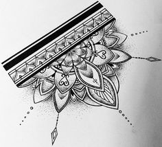 a pencil is laying on top of a piece of paper that has an intricate design