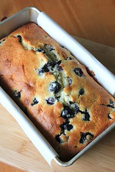 a loaf of blueberry bread in a pan