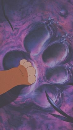 an animated hand pointing at the ground in front of purple and black background with rocks