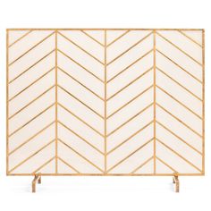 a white and gold chevroned screen with two wooden posts on each side,