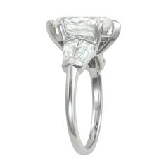 an engagement ring with a princess cut diamond in the center