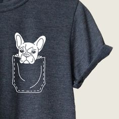 a t - shirt with an image of a dog sticking out of it's pocket