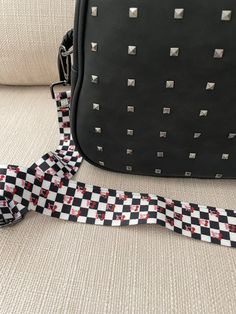 The cutest black and white checkered strap with cherries! This is an exclusive bag strap so once it sells out it won’t restock. 1.5 inches wide adjusts to about 60 inches at the longest point gold or gunmetal hardware Cherry Bag, Gunmetal Hardware, Beaded Keychains, Exclusive Bag, Bag Straps, Cute Black, The Cutest, Halloween Shopping, Pom Pom