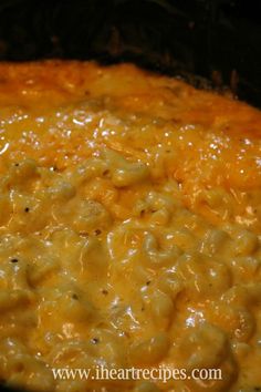 macaroni and cheese is being cooked in the slow cooker