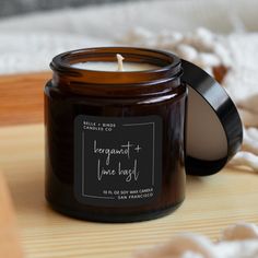 a candle sitting on top of a wooden table