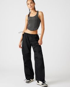 A wide leg casual pant is essential for an updated silhouette and the adjustable PIA parachute pants use stretch cord drawstrings and clever tailoring to maximize the voluminous silhouette. Wide parachute pants Zipper fly closure Two side snap pockets Stretch cord drawstring with toggle closure in waistband and cuffs Length: 30.25" 55% nylon 45% polyester Care instructions: hand wash cold separately, do not bleach, lay flat to dry, low iron if necessary, or dry clean Shop the set here Jelixza is Adjustable Pants, Parachute Pant, Casual Pant, Steve Madden Store, Side Snap, Apparel Merchandising, Casual Wide Leg Pants, 90s Streetwear, Easy Trendy Outfits