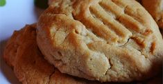 three peanut butter cookies stacked on top of each other