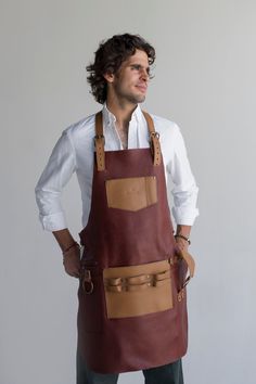 a man wearing an apron with leather straps