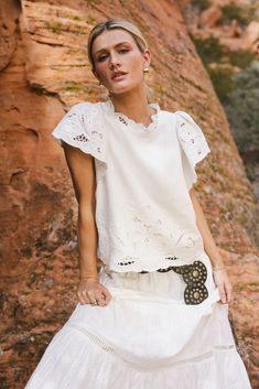 Myra Embroidered Blouse in Ivory Chic Embroidered Top With Ruffles, Summer Broderie Anglaise Embroidered Short Sleeve Top, Summer Short Sleeve Embroidered Top With Broderie Anglaise, Summer Embroidered Short Sleeve Top With Broderie Anglaise, Chic Short Sleeve Tops With Broderie Anglaise, Chic Embroidered Short Sleeve Top For Day Out, Casual White Blouse With Butterfly Sleeves, Casual Embroidered Flutter Sleeve Top, Casual Embroidered Top With Flutter Sleeves