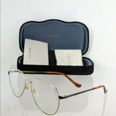 Brand New Authentic Gucci Eyeglasses Gg 0577oa 001 Black Gold 57mm Gg0577 Frame Comes With Official Case And Cloth. Gucci Glasses Case, Gucci Glasses Frames, Gold Gucci Sunglasses With Glass Material, Gold Gucci Glasses, Black Rectangular Gucci Sunglasses, Gucci Printed Eyeglasses, Gucci Eyeglasses, Brown Glasses, Gucci Glasses