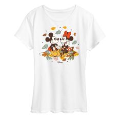 a white shirt with mickey and minnie mouse on the front, surrounded by autumn leaves