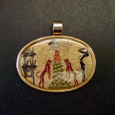 Hand carved and painted cloisonné pendant of the Minoan ancient goddess mountain mother.Depiction based on a Knossos seal impression, Crete from the bronze age ( 2700 BC - 1400 BC). It is now at Heraklion Archaeological Museum.We see a female figure atop a mountain here who must surely be the epiphany of the deity. The mountain is flanked by two lion figures. She is greeted by a saluting male figure whose body displays a tense arched-back posture. In the back are Mycenaean structures. This seal Gold Hand-painted Round Pendant Necklace, Artistic Gold Jewelry For Ceremonial Occasions, Artistic Gold Jewelry With Cabochon, Hand Painted Amulet Pendant Jewelry, Hand Painted Round Pendant Amulet Jewelry, Artistic Gold Hand Painted Necklace, Artistic Hand Painted Gold Necklace, Knossos Crete, The Epiphany