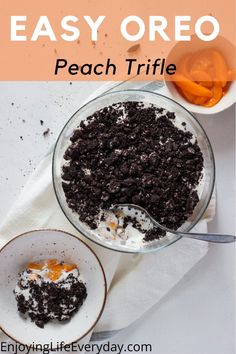 an oreo peach dessert in a glass bowl on top of a white napkin with a spoon